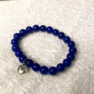 # 51 Bracelet With Apple Charm